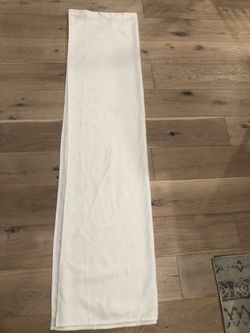 Cream colored shower curtain