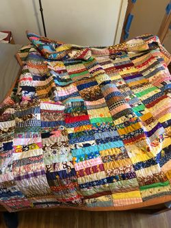 Hand sewn, hand quilted quilt.