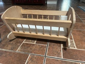 Wooden baby doll rocking crib