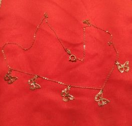 10k.gold. butterfly necklace.
