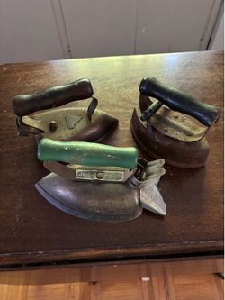 Three vintage/antique irons