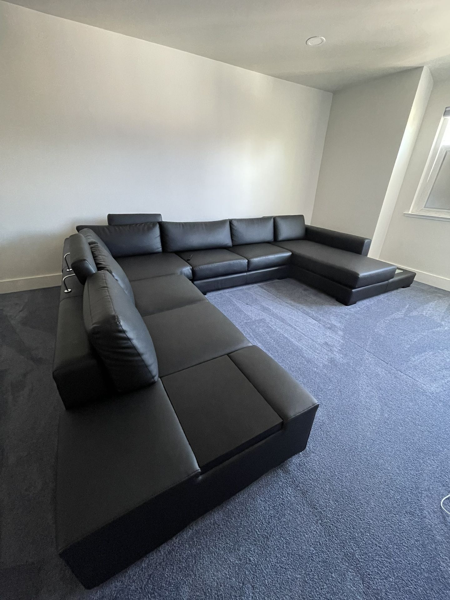 Modern Black Leather Sectional Sofa with Light