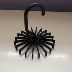 Tie or belt holder