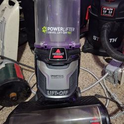 Bissell power lifter swivel lift off pet triple action vacuum.