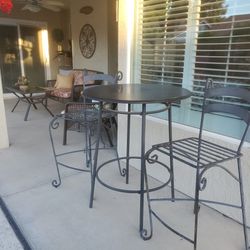 Wrought-iron Chairs And Bistro Table