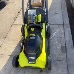 Ryobi lawnmower self propelled croos & cut come w fast charger &6ah battery 