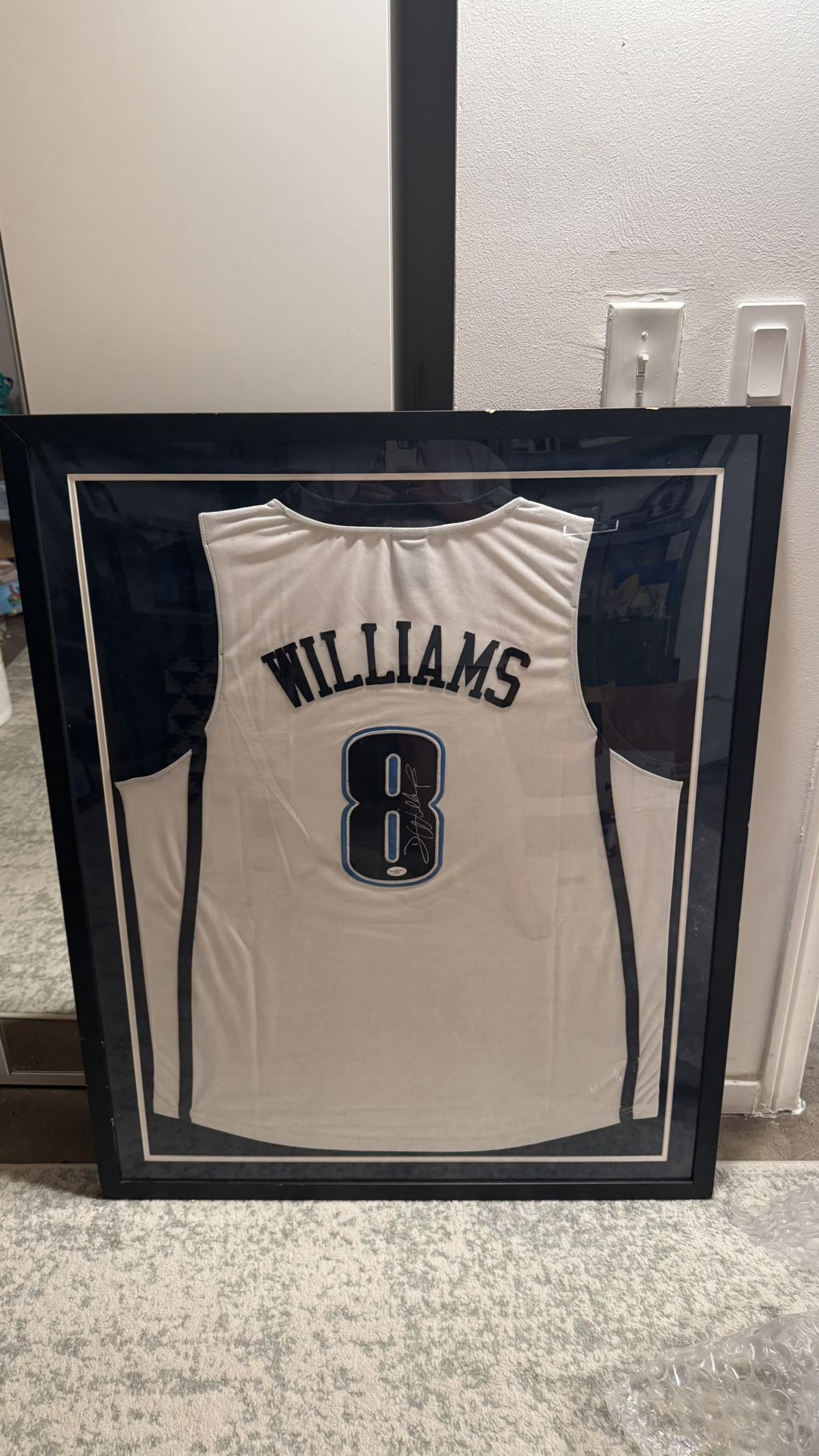 Framed Autographed Deron Williams #8 Jersey – Authenticated