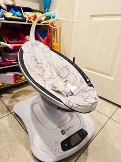 Mamaroo  multimotion baby swing