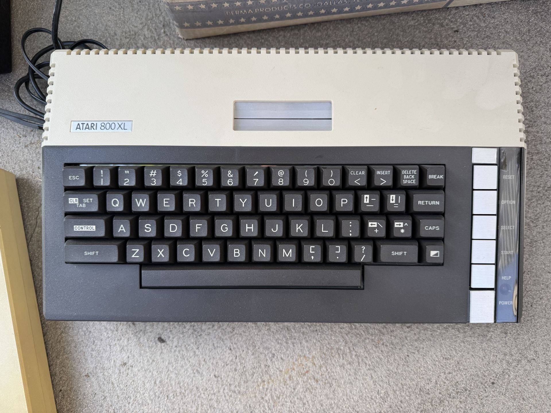 Atari 800XL retro gaming computer complete with monitor drives and software. 