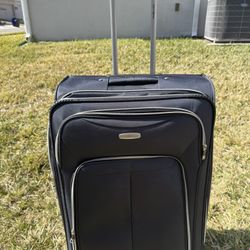 Selling BIG Samsonite suitcase, 30.5x19.5x13 inches, for check-in.