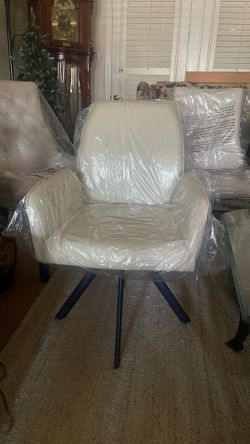 2 white chairs, very nice,padded and comfortable