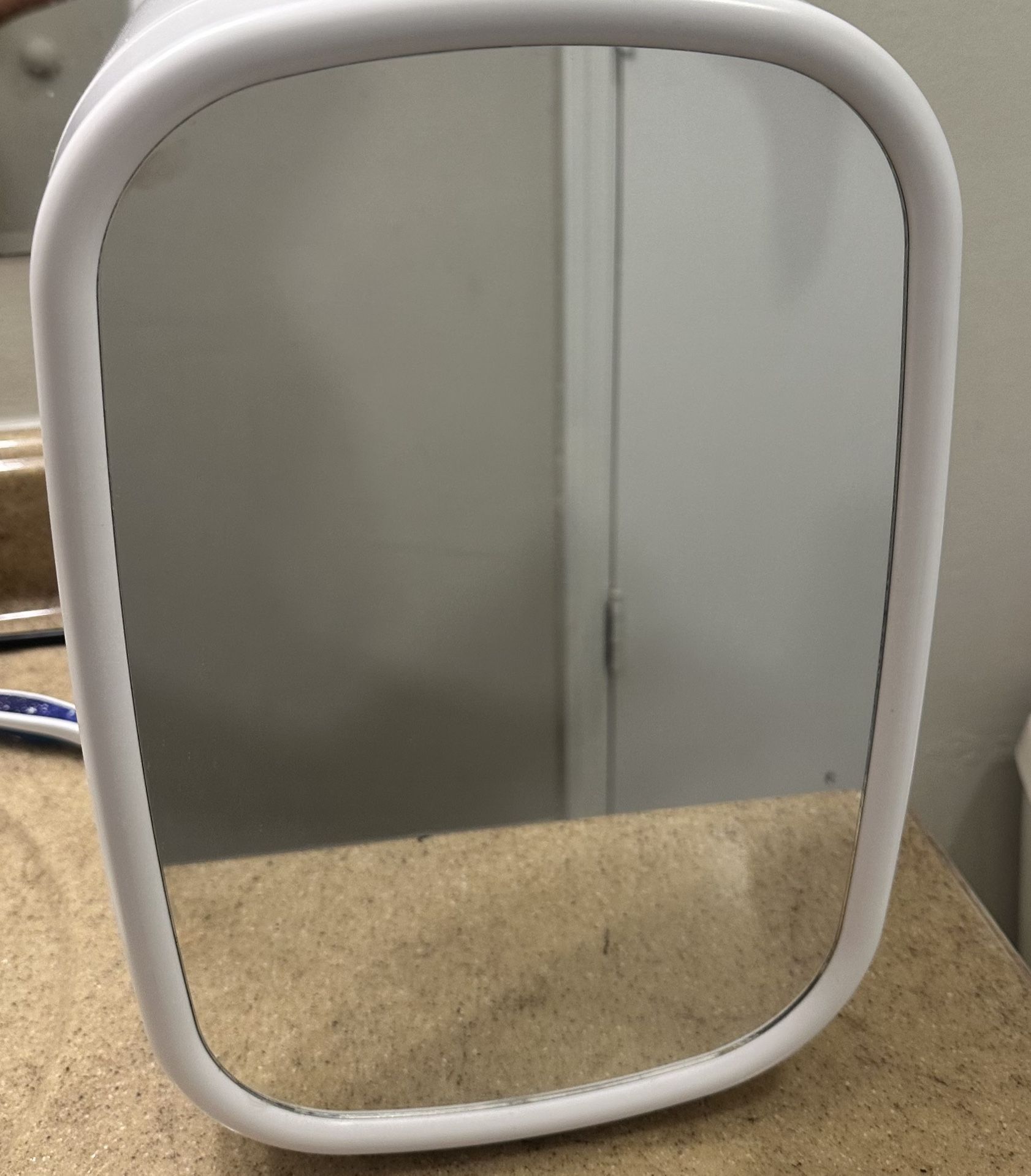 Skincare fridge with mirror