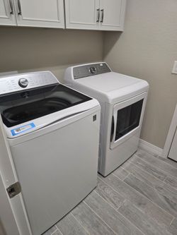 BRAND NEW GE PROFILE WASHER AND ELECTRIC DRYER NEW WHITE
