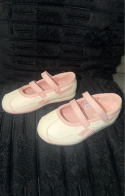 Kids Reebok pink and white shoes