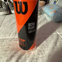 Chew tennis balls, one dollar