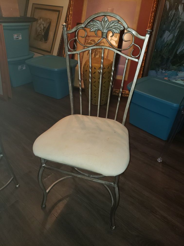 4 wrought iron chairs