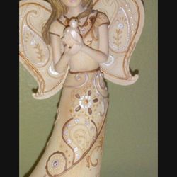 Angel Figurine Holding A Dove