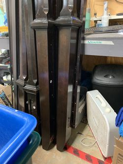 King wooden poster bed with canopy