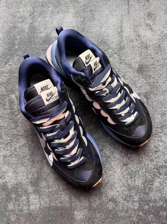 The purple Nike shoes designed by the designer