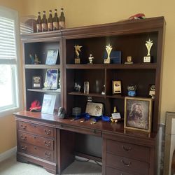 brown dresser/desk/bed frame