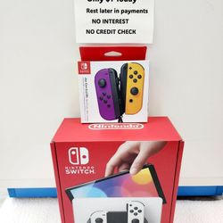 NINTENDO JOY-CON [ NEON PURPLE/NEON ORANGE] NEW IN BOX $1 DOWN TODAY REST IN PAYMENTS.NO CREDIT 