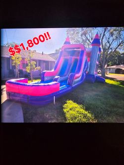 New Combo Bounce house. Comes with pool, basketball hoop inside, and dry slide attachment.