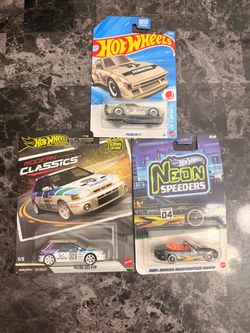 Selling a 3-car Hot Wheels Mazda collector lot, all brand new and sealed.