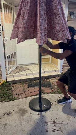 Patio umbrella with stand