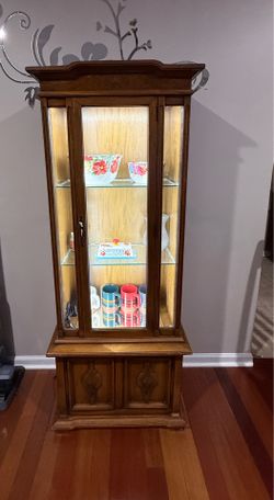 Vintage lighted display cabinet