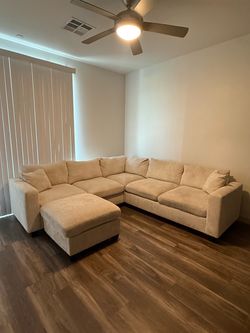 Cream Sectional + Ottoman