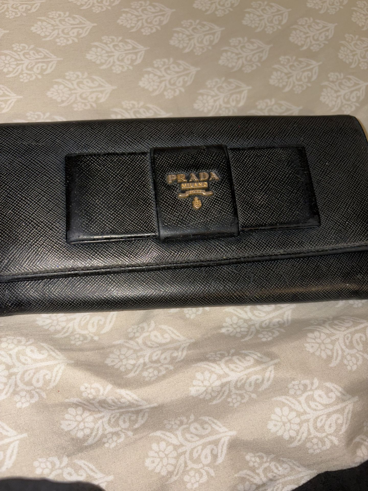 Prada black leather wallet with bow