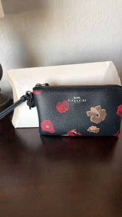 Floral Coach wristlet. Brand new without a tag