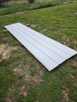 Steel siding panels