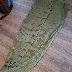 Vintage military mummy bag sleeping bag.