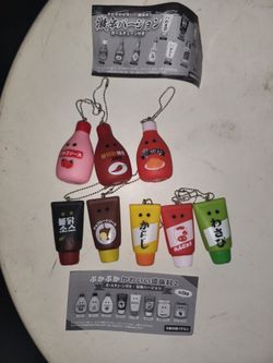 8 Small Squeaky keychains/bag charms