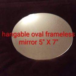 hangable oval frameless 5" x 7" wall mirror $5 FIRM
