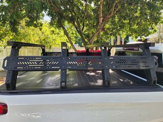 Truck Rack. Fab fours Universal adjustable Rack System over retractable truck bed cover
