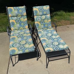 2 different style vintage wrought iron chaise loungers with cushions.  Buy them separately for $200 or both for $350  price is firm, cash only