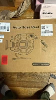 New in box Retractable Garden Hose Reel, 1/2 in x 100 ft Heavy Duty Wall-Mounted Hose Reel with 180°