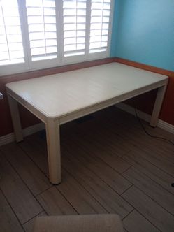 Dinner table with chairs