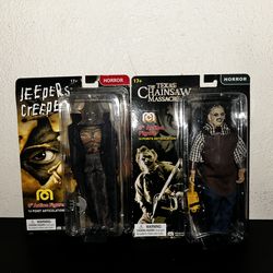2 Horror Figures still in packaging. Pickup Only.