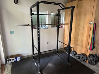 Squat Rack + Olympic Barbell + Weights