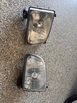 01-04 oem Tacoma headlights