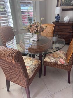 Wicker glass table and 4 chairs