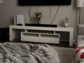 White entertainment center with shelves