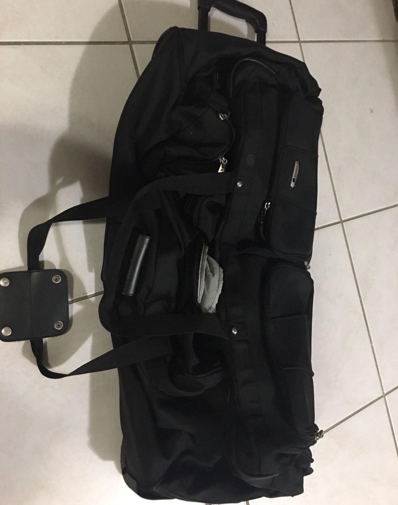 Large Delsey Rolling Duffle -travel suitcase