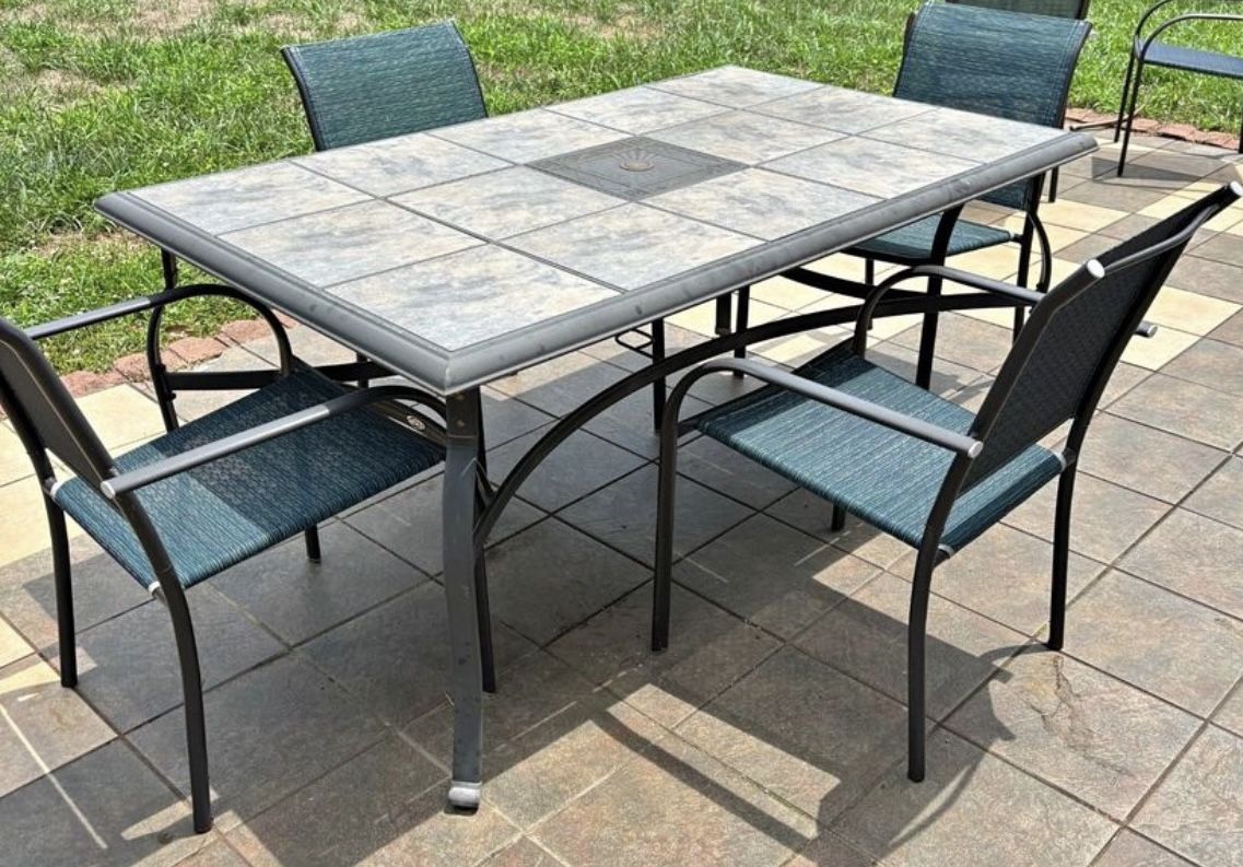 OUTDOOR PATIO SET CERAMIC TABLE AND 4 MATCHING CHAIRS