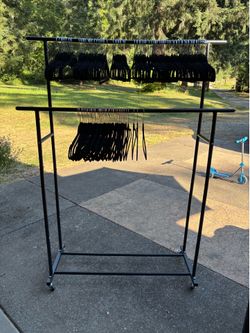 Double rod clothing rack with 130 nonslip hangers