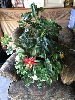 Beautiful large artificial floral arrangement in a basket