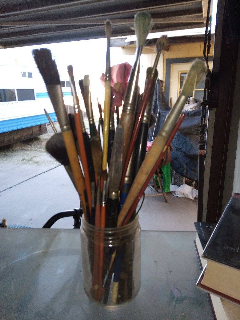 Blank Canvases And Variety Of Brushes
